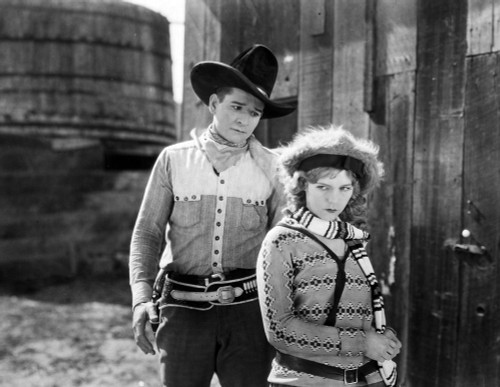 Silent Still: Man & Woman. /Nyakima Canutt In 'The Ridin' Comet.' Poster Print by Granger Collection - Item # VARGRC0002432