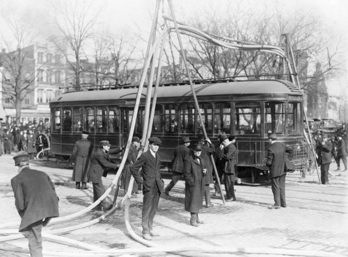 Firemen, C1918. /Nfiremen With Hoses Over A Street Car, United States. Photograph, C1918. Poster Print by Granger Collection - Item # VARGRC0409639