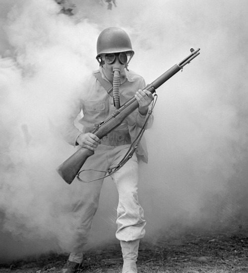Gas Mask, 1942. /Nsergeant George Camblair Learning How To Use A Gas Mask In A Practice Smokescreen At Fort Belvoir, Virginia. Photograph By Jack Delano, September 1942. Poster Print by Granger Collection - Item # VARGRC0409526