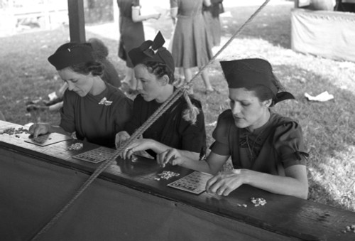 Bingo Game, 1938. /Nthree Women Playing Bingo At The Louisiana State Fair In Donaldsonville, Louisiana. Photograph By Russell Lee, November 1938. Poster Print by Granger Collection - Item # VARGRC0121698