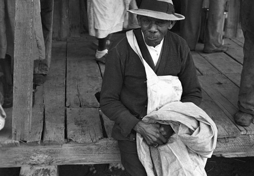 Cotton Picker, 1935. /Nan African American Cotton Picker Seated On A Porch, Pulaski County, Arkansas. Photograph By Ben Shahn In October 1935. Poster Print by Granger Collection - Item # VARGRC0119014