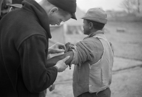 Vaccination, 1937. /Na Doctor Administering Vaccinations In The Camp For African American Flood Refugees At Marianna, Arkansas. Photograph By Walker Evans, February 1937. Poster Print by Granger Collection - Item # VARGRC0323389