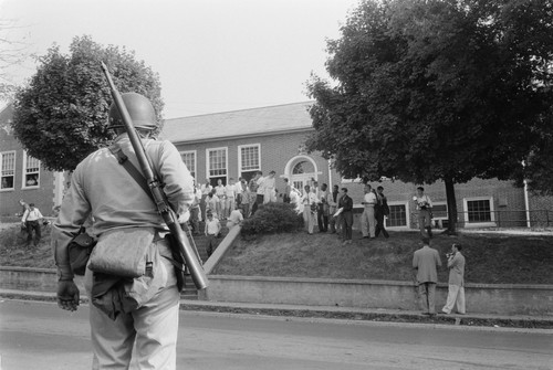 School Integration, 1956. /Nan Armed National Guardsman Observes As A Group Of The First Black Students Are Admitted To Clinton High School In Clinton, Tennessee, 1 September 1956. Poster Print by Granger Collection - Item # VARGRC0131500