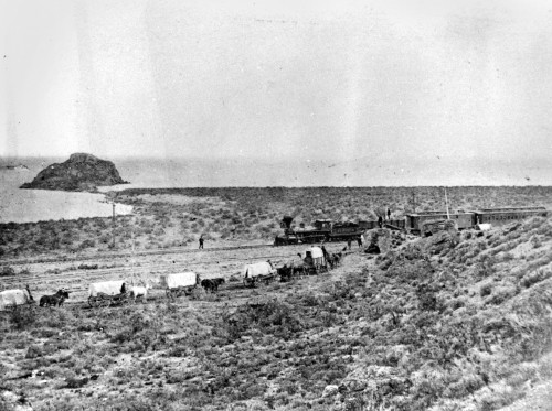 Railroad And Wagon Train. /Nthe Jupiter Steam Locomotive Of The Central Pacific Railway Meeting A Conestoga Wagon Train Going In The Opposite Direction. Photograph, Late 19Th Century. Poster Print by Granger Collection - Item # VARGRC0120731