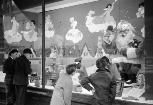 Window Shopping, 1940. /Nwindow Shoppers Looking At Toys In The Window Display Of A Store In Providence, Rhode Island. Photograph By Jack Delano, December 1940. Poster Print by Granger Collection - Item # VARGRC0322232
