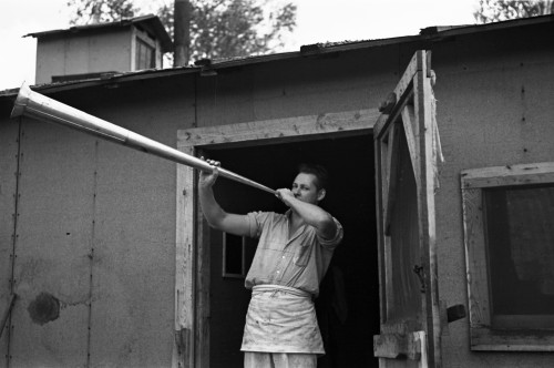 Minnesota: Lumber Camp. /Ncamp Cook Blowing Dinner Horn, At A Lumber Camp Near Effie, Minnesota. Photographed By Russell Lee, September 1937. Poster Print by Granger Collection - Item # VARGRC0120036