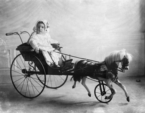 Toys: Horse Carriage, 1911. /Nvinson Walsh Mclean, Son Of American Heiress And Socialite Evalyn Mclean, Sitting In A Toy Horse And Carriage. Photograph, 1911. Poster Print by Granger Collection - Item # VARGRC0322235