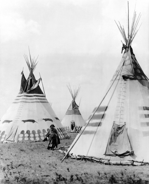 Kainai Village, C1913. /Na Kainai Woman Walking Among Painted Tepees. Photograph By Roland Reed, C1913. Poster Print by Granger Collection - Item # VARGRC0113873