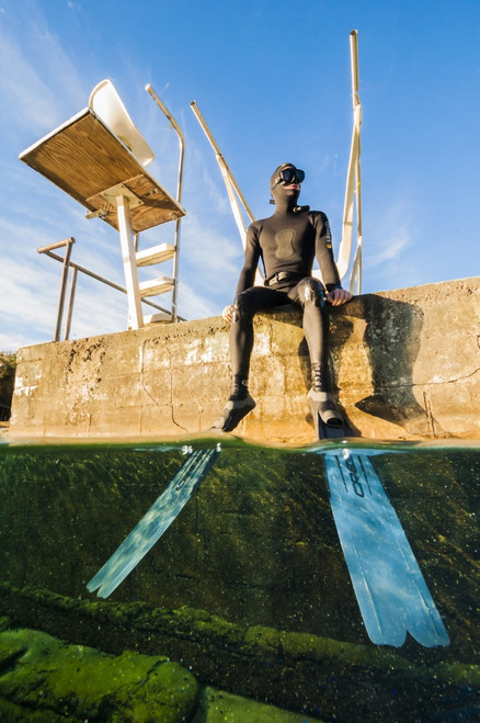 A freediver sits on the side of Jackson Blue Springs before a dive in Marianna, Florida Poster Print by Jennifer Idol/Stocktrek Images - Item # VARPSTJDL400059U