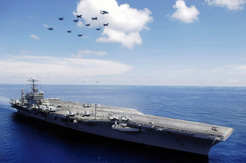 USS Abraham Lincoln and aircraft perform a aerial demonstration Poster Print by Stocktrek Images - Item # VARPSTSTK101466M