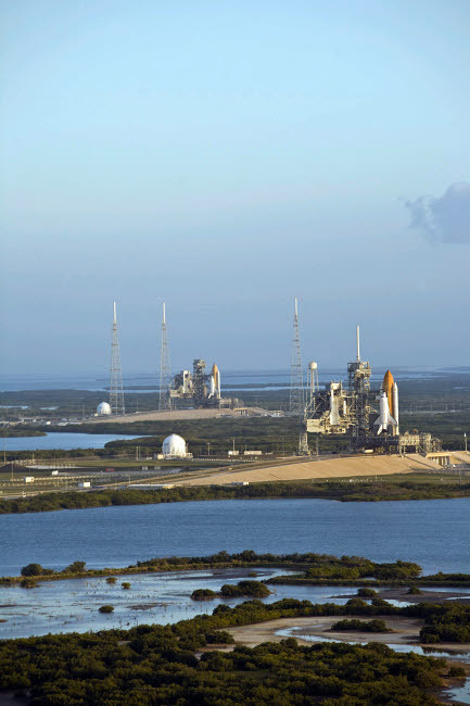 Space Shuttle Atlantis and Endeavour sit on their launch pads at Kennedy Space Center Poster Print by Stocktrek Images - Item # VARPSTSTK202756S