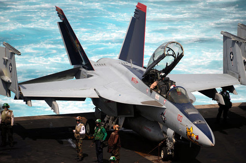An F/A-18F Super Hornet sits on the flight deck of USS Enterprise Poster Print by Stocktrek Images - Item # VARPSTSTK106439M An F/A-18F Super Hornet sits on the flight deck of USS Enterprise Poster Print by Stocktrek Images - Item # VARPSTSTK106439M