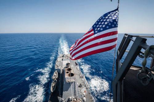 The national ensign flies from the mast aboard USS Stockdale Poster Print by Stocktrek Images - Item # VARPSTSTK107610M The national ensign flies from the mast aboard USS Stockdale Poster Print by Stocktrek Images - Item # VARPSTSTK107610M