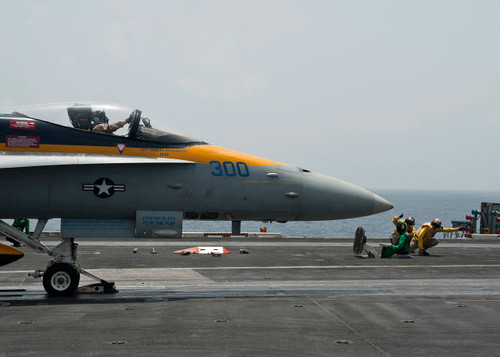 An F/A-18C Hornet launches from the flight deck of USS Nimitz Poster Print by Stocktrek Images - Item # VARPSTSTK107670M