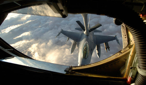 A KC-135 Stratotanker connects with an F-16 Fighting Falcon Poster Print by Stocktrek Images - Item # VARPSTSTK101636M