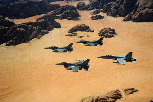 Military planes flying over the Wadi Rum desert in Jordan Poster Print by Stocktrek Images - Item # VARPSTSTK108297M