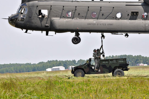 Soldiers teach students sling load operations on a CH-47 Chinook Poster Print by Stocktrek Images - Item # VARPSTSTK106584M