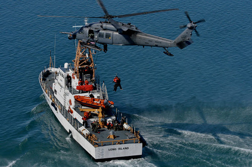 An HH-60G Pave Hawk performs a hoist over US Coast Guard Cutter Long Island Poster Print by Stocktrek Images - Item # VARPSTSTK105833M