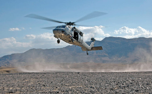 An MH-60S Seahawk helicopter practices landings in the desert Poster Print by Stocktrek Images - Item # VARPSTSTK100479M