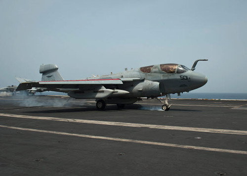 An EA-6B Prowler lands on the flight deck of USS Nimitz Poster Print by Stocktrek Images - Item # VARPSTSTK107641M