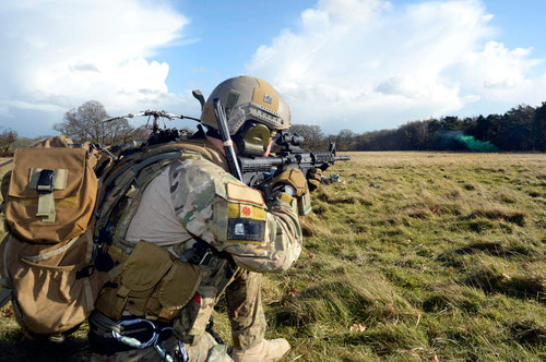 Airman sets up a perimeter defense at the Stanford Training Area, England Poster Print by Stocktrek Images - Item # VARPSTSTK108578M