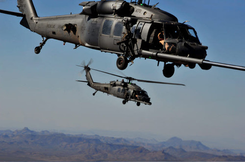 Two HH-60 Pave Hawk helicopters prepare for aerial refueling Poster Print by Stocktrek Images - Item # VARPSTSTK104921M Two HH-60 Pave Hawk helicopters prepare for aerial refueling Poster Print by Stocktrek Images - Item # VARPSTSTK104921M