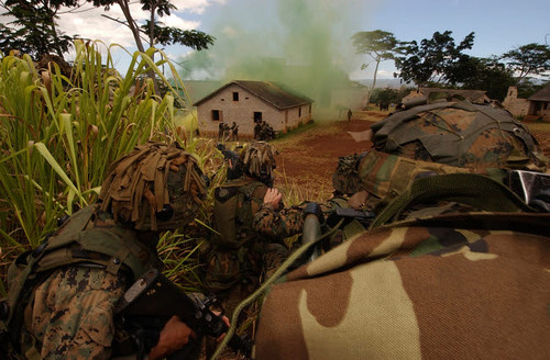 Marines prepare to move in on a city occupied by opposition forces Poster Print by Stocktrek Images - Item # VARPSTSTK100583M