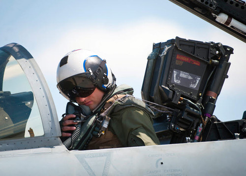 Naval aviator performs pre-flight checks on an F/A-18C Hornet Poster Print by Stocktrek Images - Item # VARPSTSTK108307M