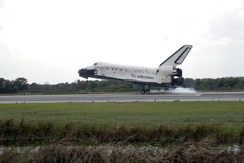 Space Shuttle Discovery touches down on the runway at Kennedy Space Center Poster Print by Stocktrek Images - Item # VARPSTSTK202527S