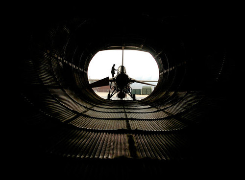 Technician prepares an F-16 Fighting Falcon Poster Print by Stocktrek Images - Item # VARPSTSTK101381M