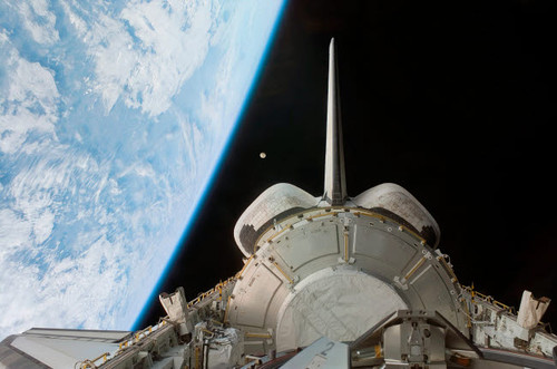 Space Shuttle Discovery's payload bay backdropped by Earth's horizon Poster Print by Stocktrek Images - Item # VARPSTSTK201660S