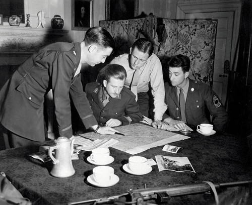 Jedburghs get instructions from briefing officer in London flat, England Poster Print by Stocktrek Images - Item # VARPSTSTK106020M