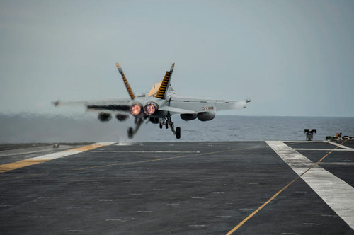 An F/A-18E Super Hornet takes off from the flight deck of USS George Washington Poster Print by Stocktrek Images - Item # VARPSTSTK108067M