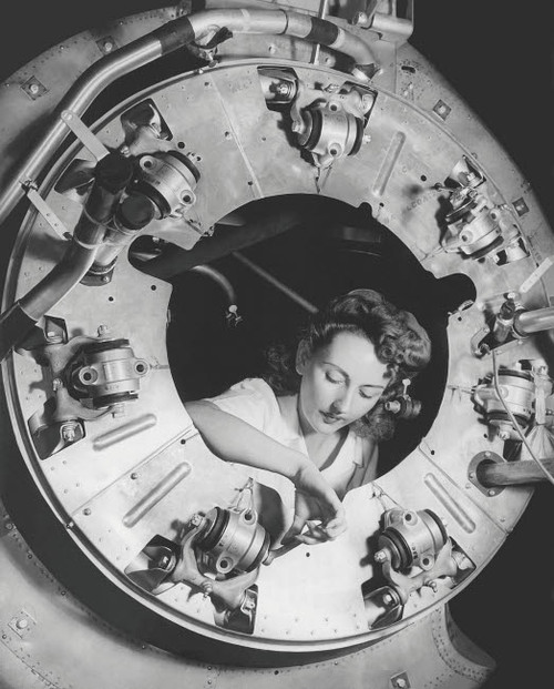 A woman assembles part of the cowling of a B-25 bomber motor circa 1942 Poster Print by Stocktrek Images - Item # VARPSTSTK500246A