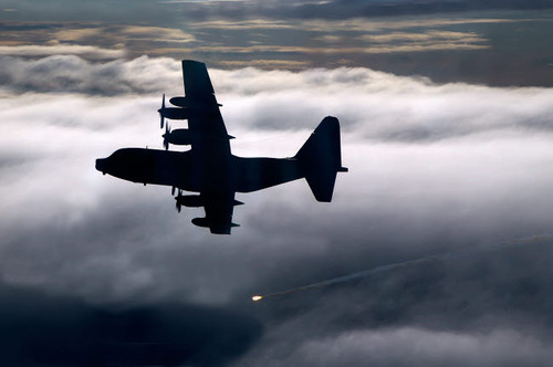 A MC-130P Combat Shadow dropping a flare Poster Print by Gert Kromhout/Stocktrek Images - Item # VARPSTGKR100169M