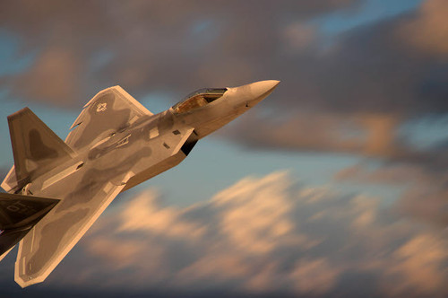 F-22 Raptor flying at high-speed over Nevada Poster Print by Phil Wallick/Stocktrek Images - Item # VARPSTPWA100060M