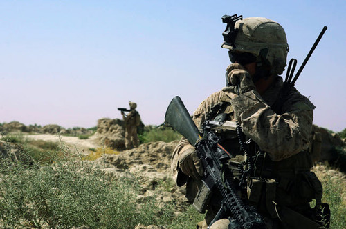 US Marine uses a radio during a security patrol in Afghanistan Poster Print by Stocktrek Images - Item # VARPSTSTK104034M