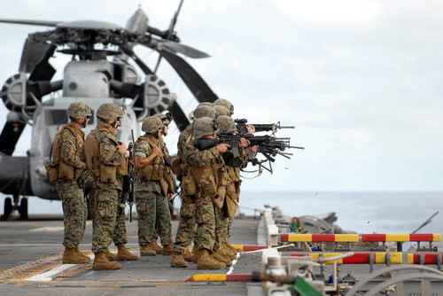 Marines conduct marksmanship training aboard USS Essex Poster Print by Stocktrek Images - Item # VARPSTSTK102486M