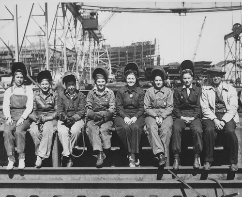 Women welders wearing protective clothing and seated outdoors Poster Print by Stocktrek Images - Item # VARPSTSTK500232A