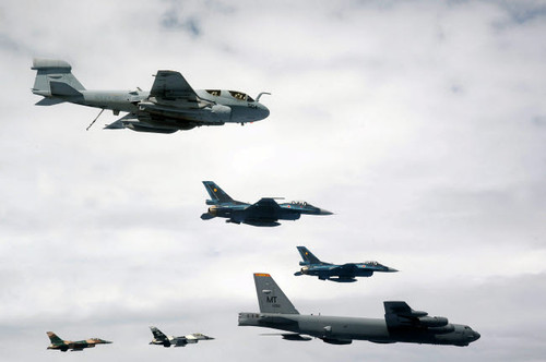 A B-52 Stratofortress leads a formation of aircraft over Guam Poster Print by Stocktrek Images - Item # VARPSTSTK102957M