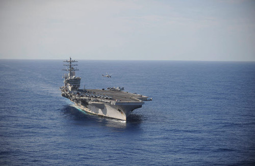 An MH-60R Sea Hawk helicopter performs maneuvers above USS Nimitz Poster Print by Stocktrek Images - Item # VARPSTSTK108144M An MH-60R Sea Hawk helicopter performs maneuvers above USS Nimitz Poster Print by Stocktrek Images - Item # VARPSTSTK108144M