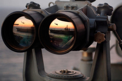 Aircraft carrier USS Dwight D Eisenhower is reflected in a set of Big Eyes binoculars Poster Print by Stocktrek Images - Item # VARPSTSTK100189M