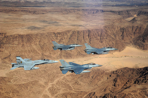 Military planes flying over the Wadi Rum desert in Jordan Poster Print by Stocktrek Images - Item # VARPSTSTK108296M