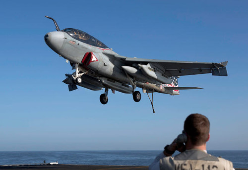 An EA-6B Prowler comes in for an arrested landing aboard USS Dwight D Eisenhower Poster Print by Gert Kromhout/Stocktrek Images - Item # VARPSTGKR100220M