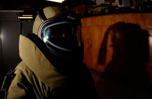 An Aviation Ordnanceman wears a heavy protective bomb suit during training Poster Print by Stocktrek Images - Item # VARPSTSTK103529M
