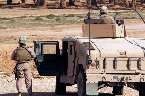 Marines watch the surrounding desert during a Mounted Combat Patrol Poster Print by Stocktrek Images - Item # VARPSTSTK101925M