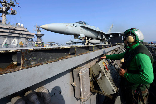 Aviation Boatswain's Mate launches an F/A-18C Hornet from USS John C Stennis Poster Print by Stocktrek Images - Item # VARPSTSTK106733M Aviation Boatswain's Mate launches an F/A-18C Hornet from USS John C Stennis Poster Print by Stocktrek Images - Item # VARPSTSTK106733M