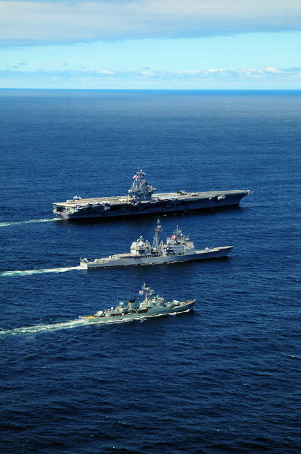 US Navy ships perform tactical maneuvering exercises in the Atlantic Ocean Poster Print by Stocktrek Images - Item # VARPSTSTK103742M