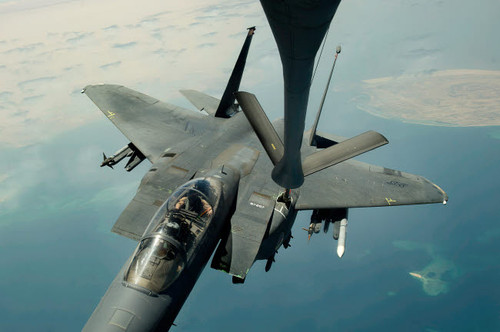 An F-15E Strike Eagle receives fuel from a KC-135R Stratotanker Poster Print by Stocktrek Images - Item # VARPSTSTK107798M