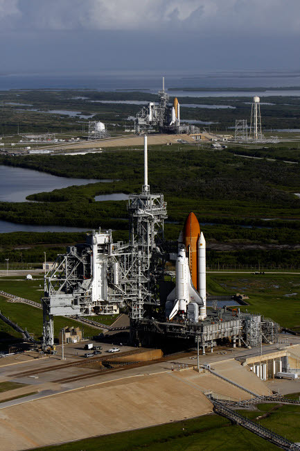 Space Shuttle Atlantis and Endeavour sit on their launch pads at Kennedy Space Center Poster Print by Stocktrek Images - Item # VARPSTSTK202641S